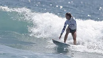 С душа на сърфист: Бетани Хамилтън губи ръката си след ухапване от акула, но продължава да се състезава професионално