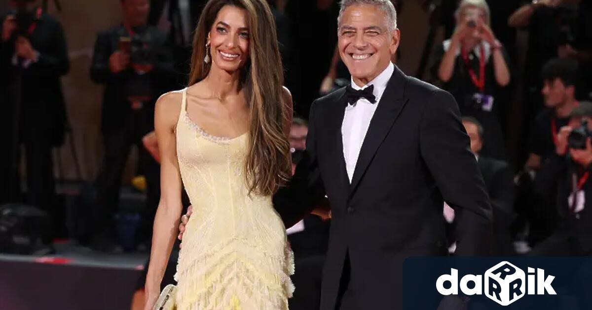 Американският актьор Джордж Клуни заедно със съпругата си Амал и